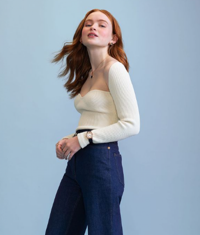 Sadie Sink white cleavage sweater